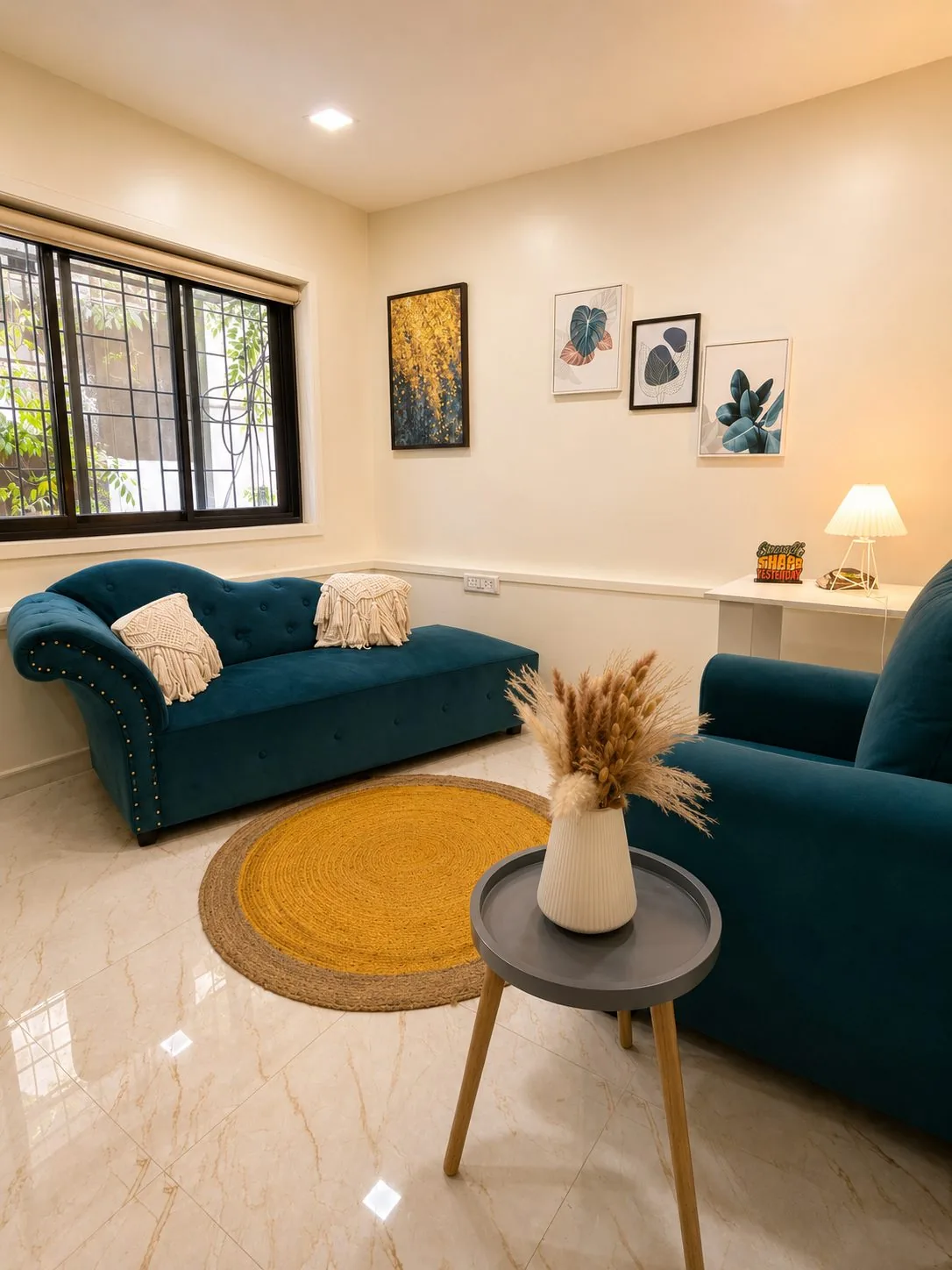 CINQ.IN therapy room with blue chaise lounge, yellow rug and warm lamps in Baner, Pune